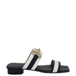 Sandali bassi bicolore neri e bianco con accessorio oro
